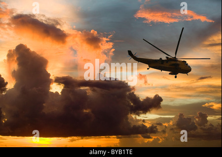 Sunset from Funafuti Tuvalu with a Sea King Helicopter. Stock Photo