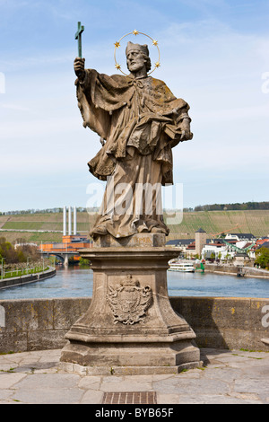 Alte Mainbruecke Main river bridge with statue of St. John of Nepomuk, Wuerzburg, Bavaria, Germany, Europe Stock Photo