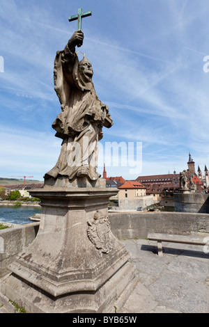 Alte Mainbruecke Main river bridge with statue of St. John of Nepomuk, Wuerzburg, Bavaria, Germany, Europe Stock Photo