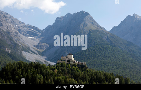 Mountain panorama, Castle Tarasp, landmark of the Lower Engadine, on a conical rocky hill in the scattered settlement Tarasp Stock Photo