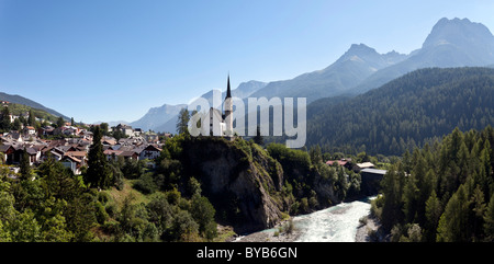 Inn Valley with views towards the Reformed Church in Scuol, Lower Engadine, Graubuenden or Grisons, Switzerland, Europe Stock Photo
