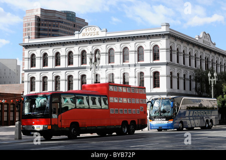 Rotel coach, Rotel coach, a bus incorporating a mobile hotel, passing Pico House, Los Angeles, California, USA Stock Photo