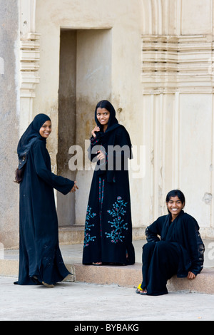 Young Muslim Women at Qutb Shahi Tombs in Golconda in Hyderabad India Stock Photo