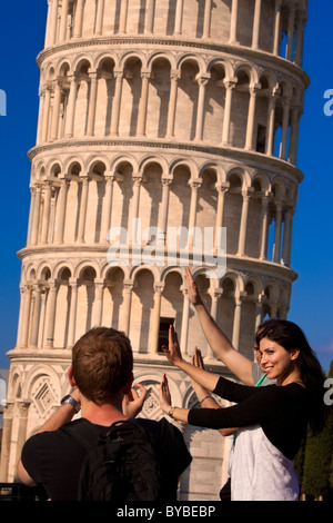 de rigueur photo op for tourists in Pisa - holding up the tower, Pisa Tuscany Italy Stock Photo