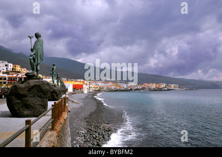 Town and beach of Candelaria, with the famous statues of Guanche, of the eastern part of Tenerife in the Spanish Canary Islands. Stock Photo