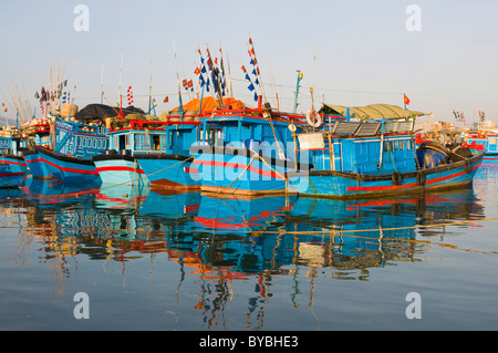 Blue fishing boats in the harbour of Nha Trang, Vietnam, Asia Stock Photo