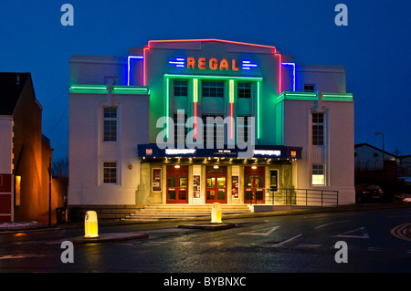 Formerly a cinema the illuminated The Regal in Bathgate West Lothian Scotland is now a community theatre Stock Photo