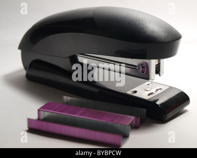 Black Stapler and Staples isolated on a white background Stock Photo