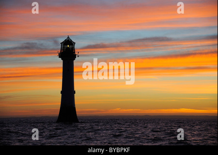 The Bell Rock Lighthouse 12 miles off the coast of Arbroath in the north east of Scotland.  Photographed in January  2011 Stock Photo