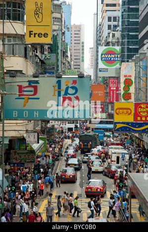 Crowded street full of shoppers in the Mong Kok area of Hong Kong Stock Photo