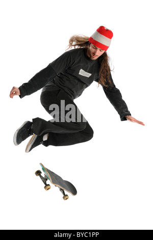 Skateboarder jumping isolated over white background Stock Photo