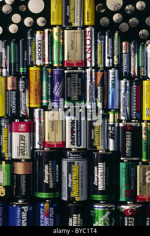 An aligned array of dry cell batteries Stock Photo