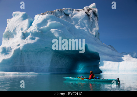 Kayaking in Bear Lagoon, Kenai Fjords National Park, near Seward, Alaska. (model released) Stock Photo