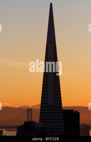 Transamerica Pyramid and Bay Bridge, San Francisco, CA Stock Photo