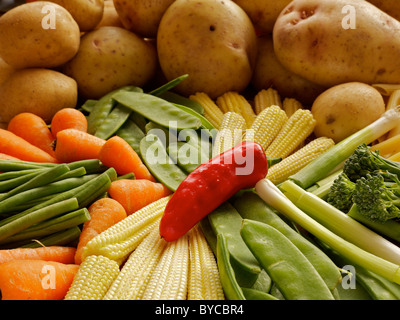 Red chilli in a pile of fresh raw vegetables Stock Photo
