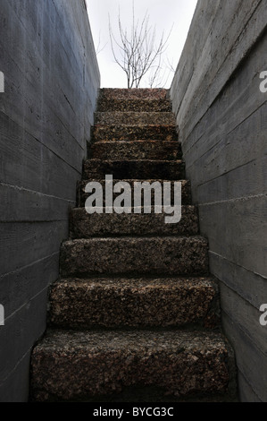 Stone stair steps and concrete walls Stock Photo