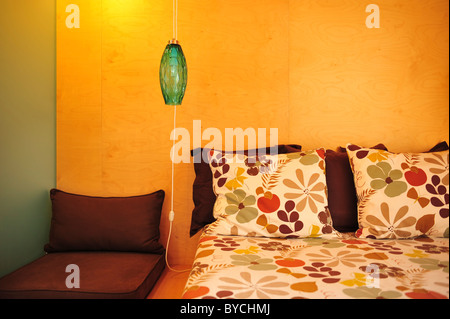 Suspended bedside green glass lamp Stock Photo