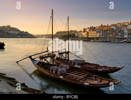 Portugal, Oporto, Porto port wine barges at dusk Stock Photo