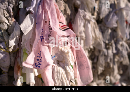 Multilingual handwritten prayers and wishes pinned to a wall a the House of the Virgin Mary, near Ephesus, Turkey Stock Photo