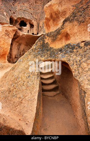 Narrow passage that leads to Selime monastery, at the edge of Ihlara Valley, Aksaray, Cappadocia, Turkey Stock Photo