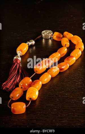 A Greek 'komboloi' ('rosary' or 'worry beads') made of amber. Very popular men's accessory in Greece Stock Photo
