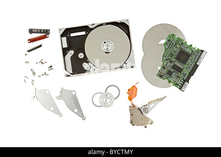 Parts of a disassembled computer hard drive. Stock Photo