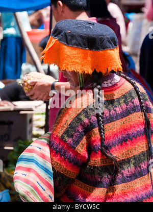 Lady in the market wearing traditional Peruvian ladies hat at Pisac, Sacred Valley, Peru, South America. Stock Photo