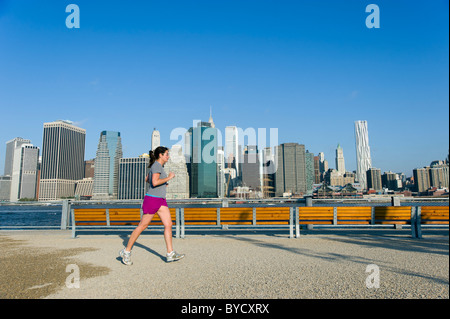 Woman jogging in Brooklyn, New York City, USA Stock Photo