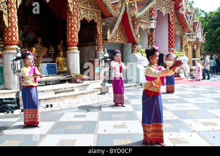Woman dancing dressed in traditional costumes, Wat Phra That Doi Suthep, Chiang Mai, Thailand Stock Photo