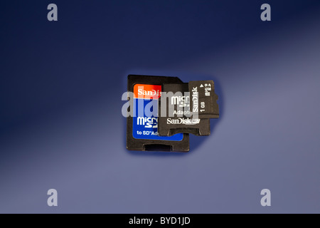 Mini SD card and adapters on a colored background Stock Photo