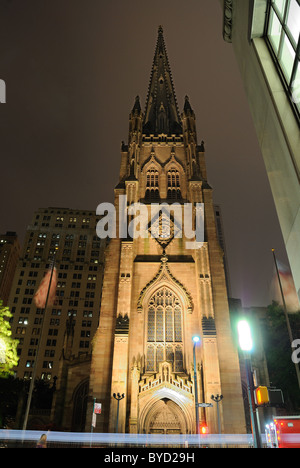 Trinity Church and its steeple at night in New York City. Stock Photo