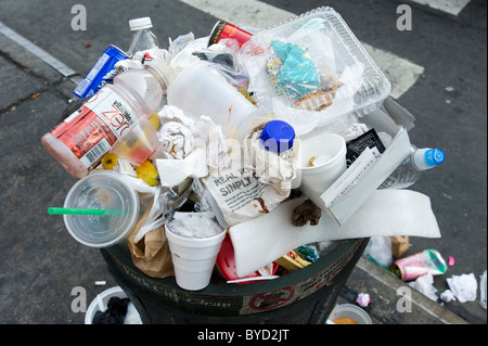 Overflowing rubbish bin, New York City, USA Stock Photo