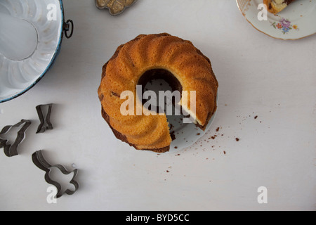 Gugelhupf cake or bundt cake with crumbs Stock Photo