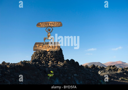 Devil sculpture at the entrance to Montana del Fuego de Timanfaya National Park, volcanic landscape, Lanzarote, Canary Islands
