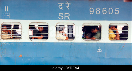 Railroad carriage for 2nd class passengers with barred windows, men's section, Ernakulam, Ochanathuruthu, Kerala, India, Asia Stock Photo