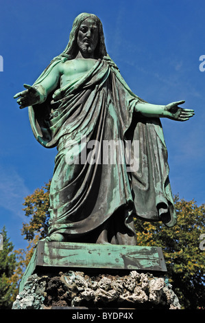 Big statue of Jesus on a 19th century grave on the Johannisfriedhof cemetery, founded in the 13th century Stock Photo