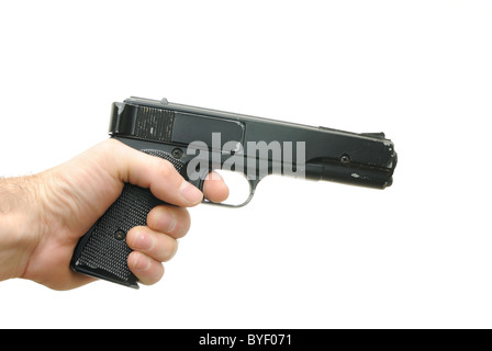 Man pointing a gun isolated on white background. Stock Photo