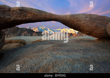 Lathe Arch in Alabama Hills with the Sierras in the background. Alabama Hills, Lone Pine, California, USA. Stock Photo