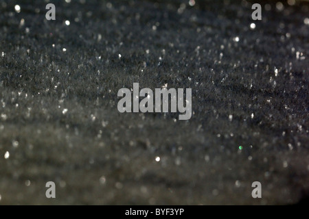 Black snow crystals, snow flakes, close-up Stock Photo