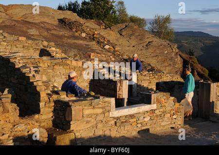 Workers in the rooms of the ' Domus '   Archaeological site ' Chao Samartin ' Asturias SPAIN Stock Photo