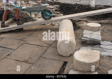 Working in the patio of the ' Domus '   Archaeological site ' Chao Samartin ' Asturias SPAIN Stock Photo
