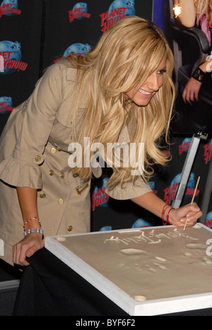 Ashley Tisdale celebrates her debut CD 'Headstrong' with a handprint ceremony at Planet Hollywood Times Square  New York City, Stock Photo