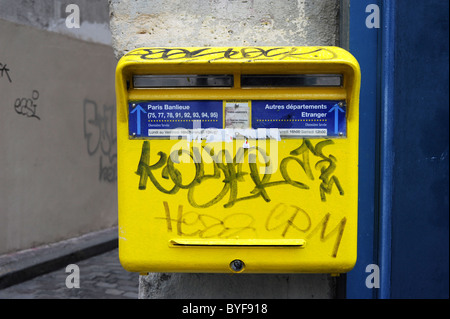 La Poste, A French Post Box covered in Graffiti Stock Photo