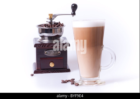 Coffee cup with coffee maker and beans in white background Stock Photo