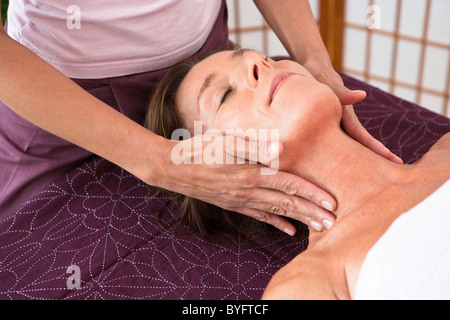 Head massage in spa Stock Photo