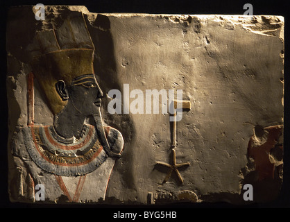 Egyptian Art. Polychrome relief depicting god Amun-Min as pharaoh. From Thutmose III temple in Deir el-Bahari. Stock Photo