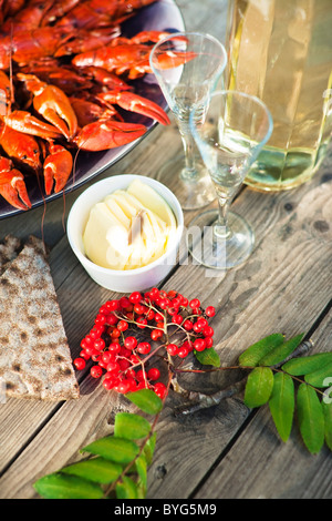 Meal with crayfishes on outdoor table Stock Photo