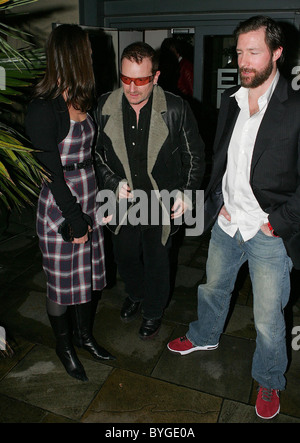 Christy Turlington, Bono and Ed Burns leave the Eden Restaurant in Temple Bar after enjoying dinner with Edward Burns after the Stock Photo