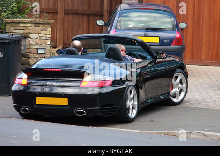Kerry Katona brings home a wedding present for her new husband Mark Croft - a brand new Porsche Wilmslow, Cheshire - 14.03.07 Stock Photo