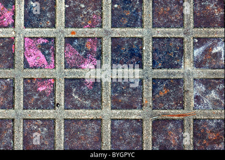 Rusty metal squares stained surface. Industrial background texture. Stock Photo